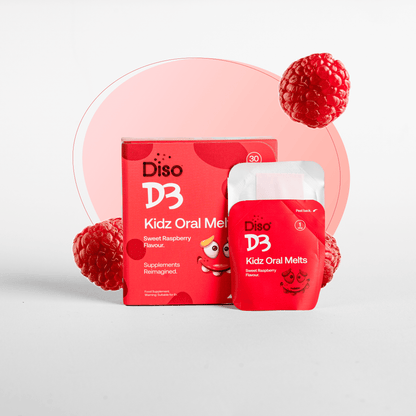 Red packaging of Diso D3 Kidz Oral Melts with raspberries on a light gray background