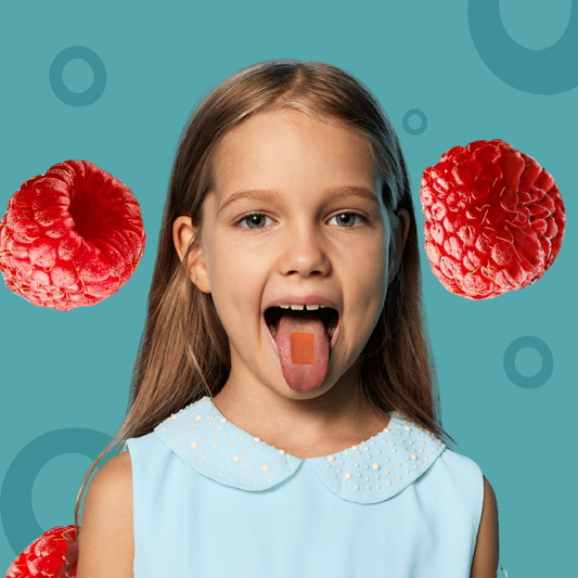 Young girl with a dissolvable vitamin strip on her tongue against a blue background with red raspberry graphics