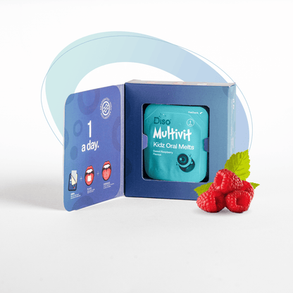 Blue box of Disney Multivit Kids' Oral Melts with raspberries and leaves on a white background